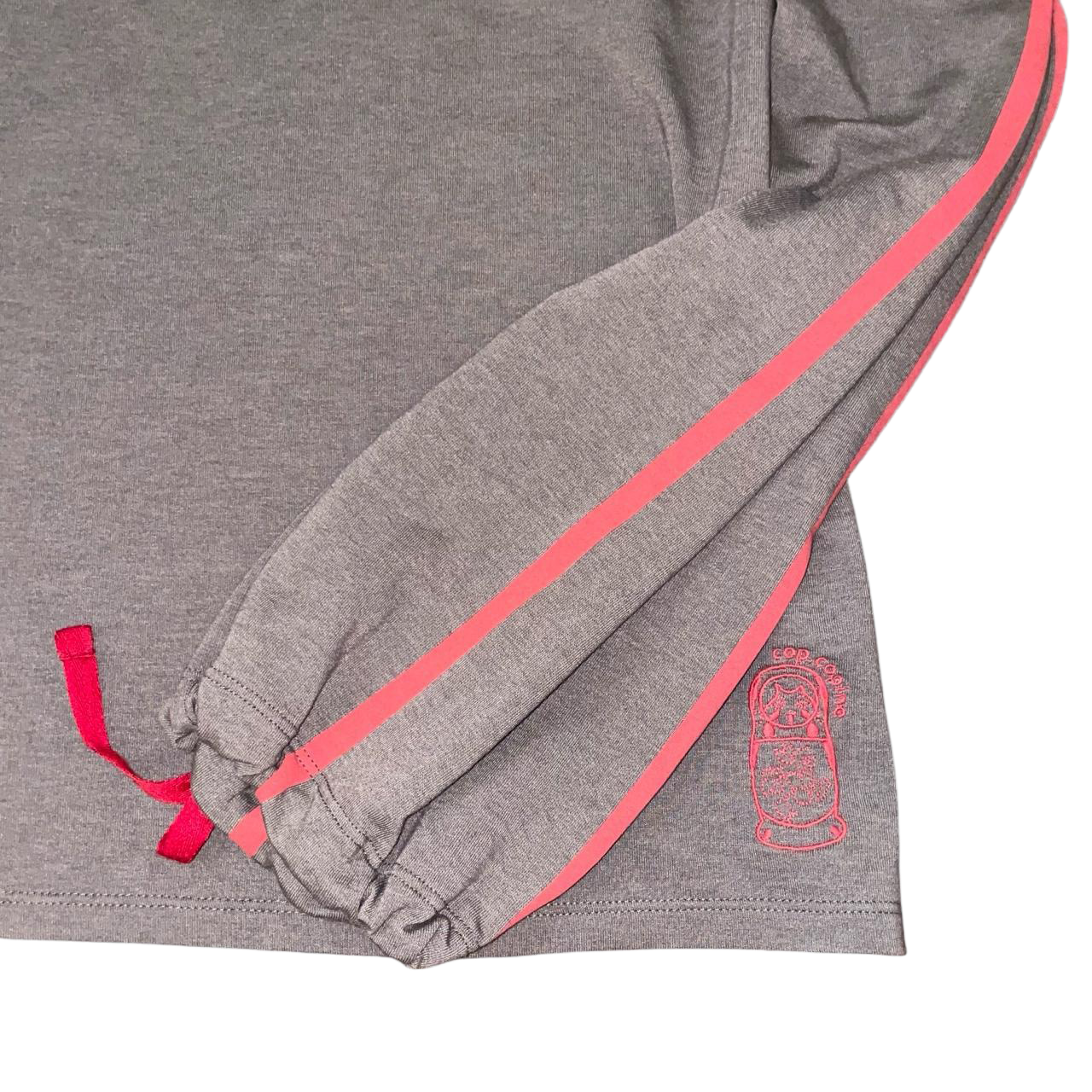 Cop. Copine brown long sleeve with red accents