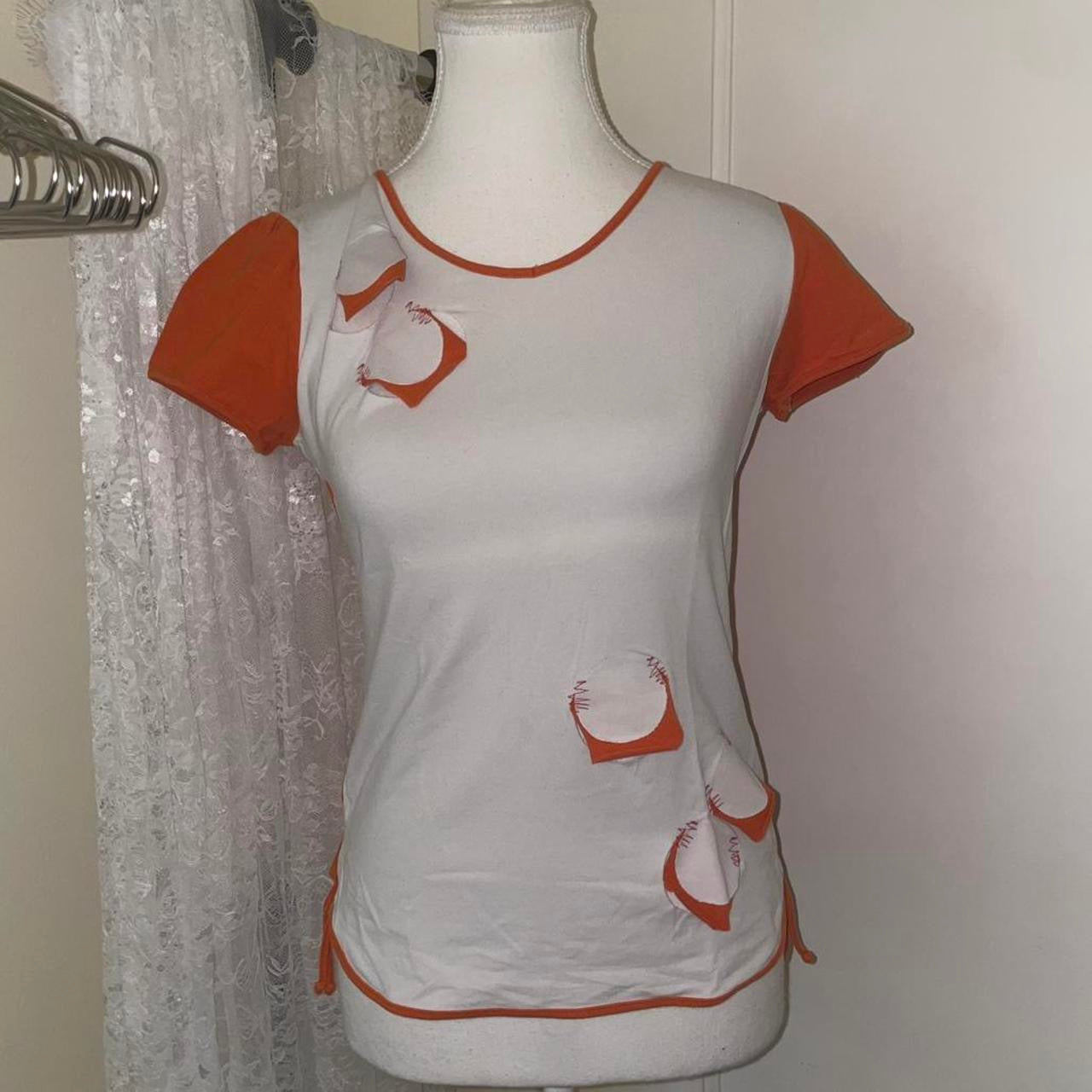 Cop. Copine white and orange cut out avant garde top