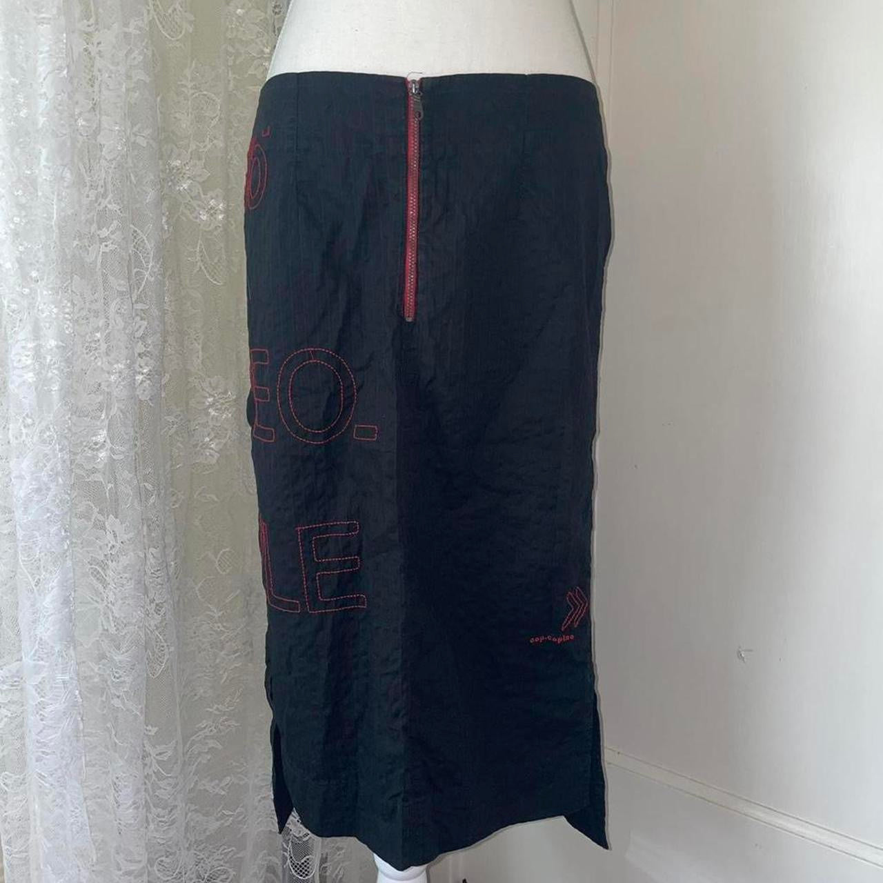 Cop. Copine black midi skirt with red accents