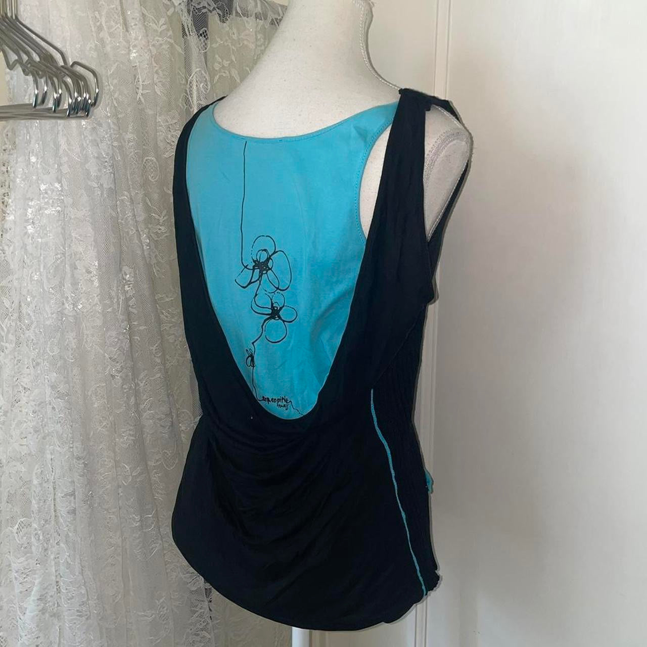 Cop. Copine black ribbed avant garde tank